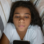 Health & Wellness Americans are ‘Doomscrolling’ at Bedtime Prioritizing Screen Time Over Sleep