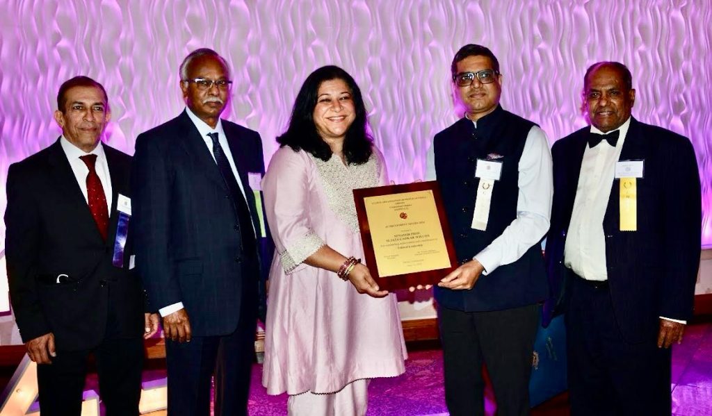 DCG Vishal Harsh presenting the award to CT State Senator Sujata Gadkar Wilcox